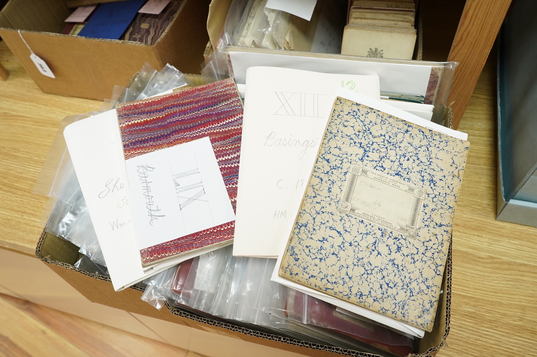 A collection of mid 19th to early 20th century Ordnance Survey maps, including some unusual issues, quarter-inch large sheet folded maps with marbled covers and green cotton edges, etc.